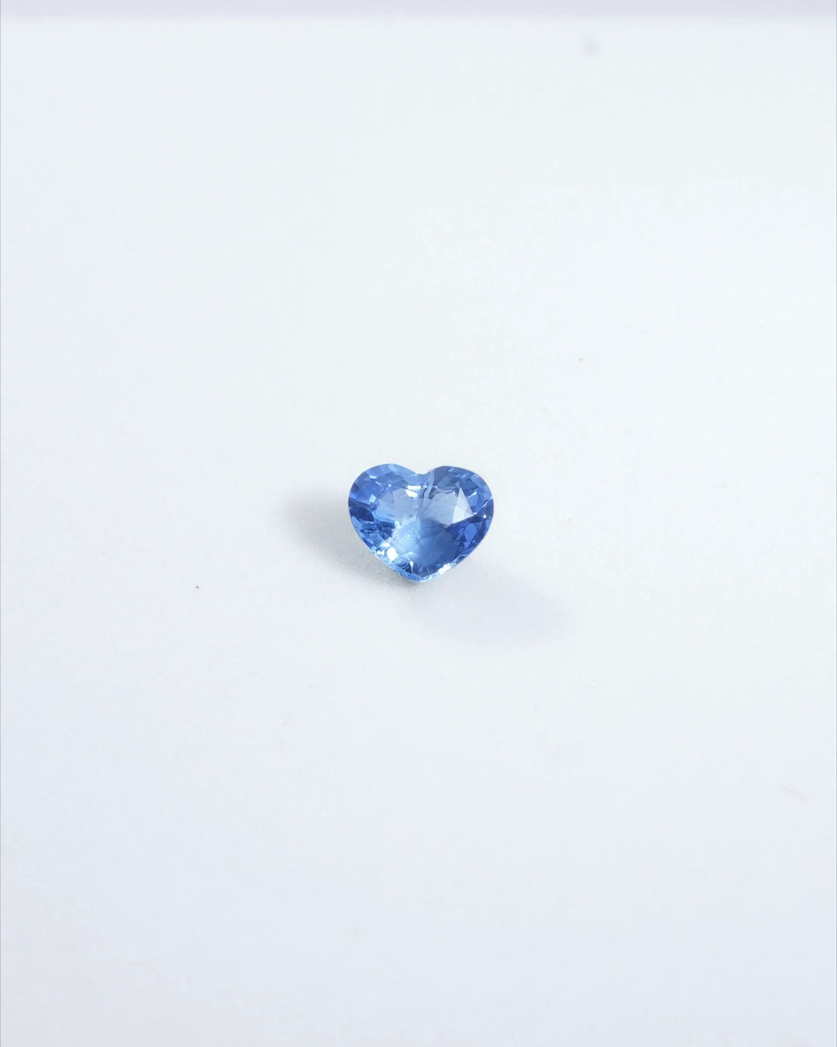 Heart-shaped blue gemstone, elegant and radiant for fine jewelry designs