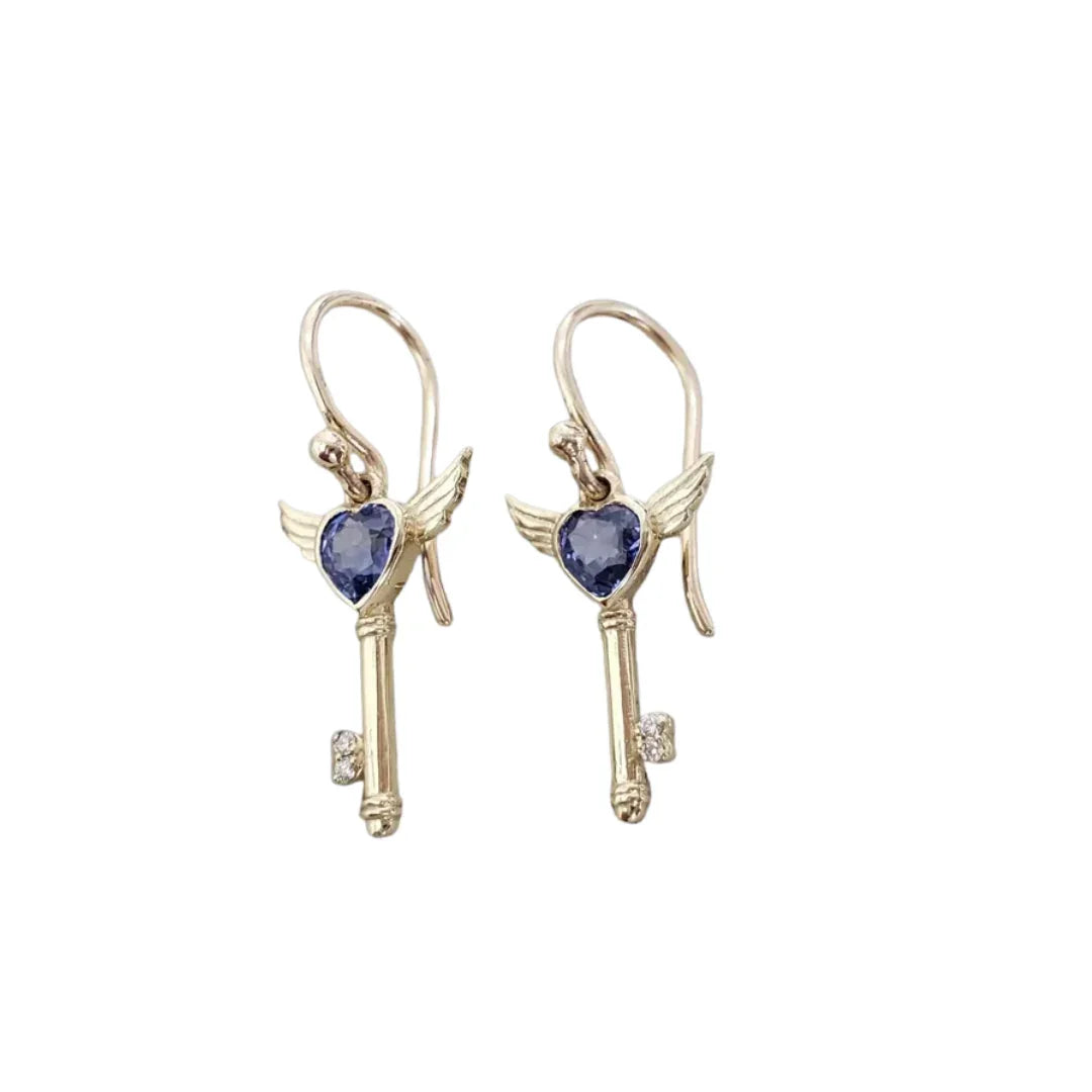 Clous d'oreilles en or 14 carats avec topaze bleue suisse et pierre de naissance