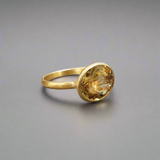 Citrine 14k Gold Ring Sid View Against Grey Background