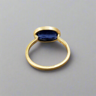 18k Gold Oval Kyanite Ring in elegant and Minimalistic Design