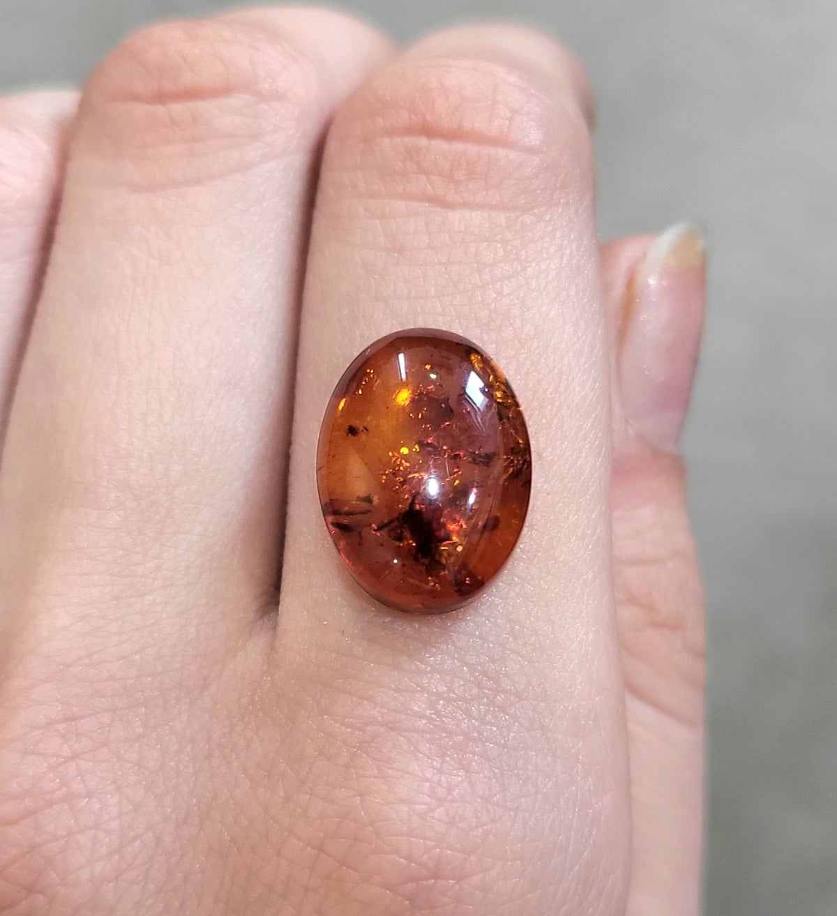 3.63 ct Natural Reddish Orange Amber Oval shape - #AB3
