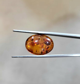 3.63 ct Natural Reddish Orange Amber Oval shape - #AB3