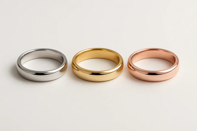 3 plain rings - 1 in silver , 1 in gold , 1 in rose gold 