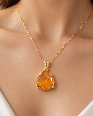 14k Gold Orange Fire Opal Pendant • Diamond Bail