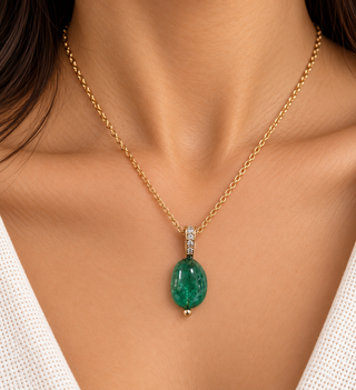 Pendentif en or 14 carats avec rubis et émeraude