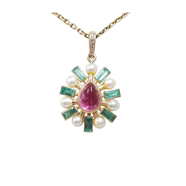 Elegant pendant with pink tourmaline, emerald, and pearl accents on gold chain