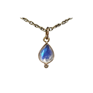 Rainbow Moonstone Diamond Pendant On Chain Shown On White Background