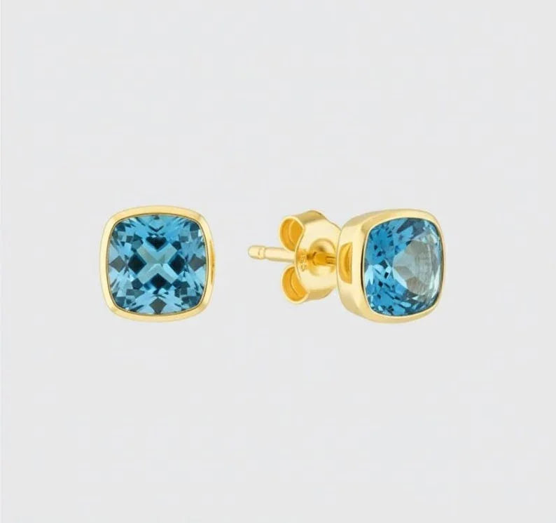 Ohrstecker aus 14 Karat Gold mit Schweizer Blautopas