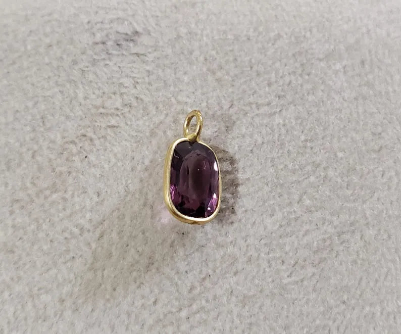 Pendentif en or 14 carats avec rubis et émeraude