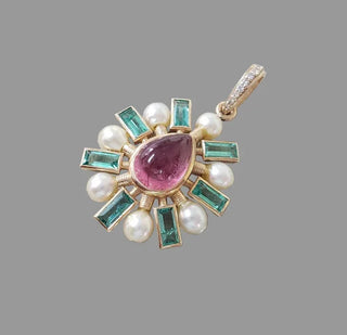 Elegant pendant with pink gemstone, pearls, and emerald accents in gold setting