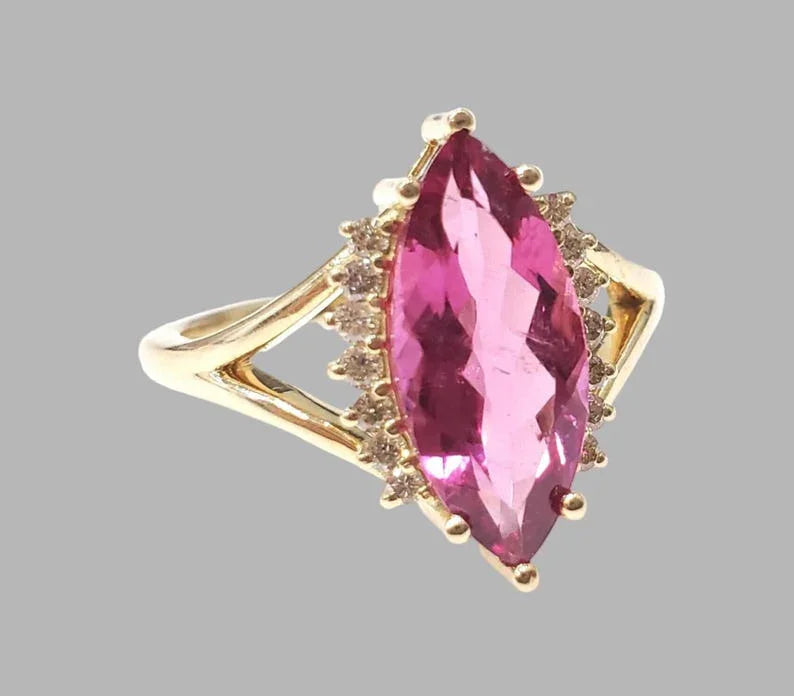 14 Karat Goldring mit rosa Turmalin und Diamant