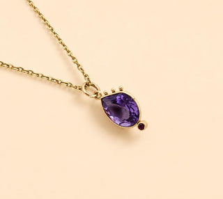 Runder Anhänger aus violettem Amethyst aus 14 Karat Gold