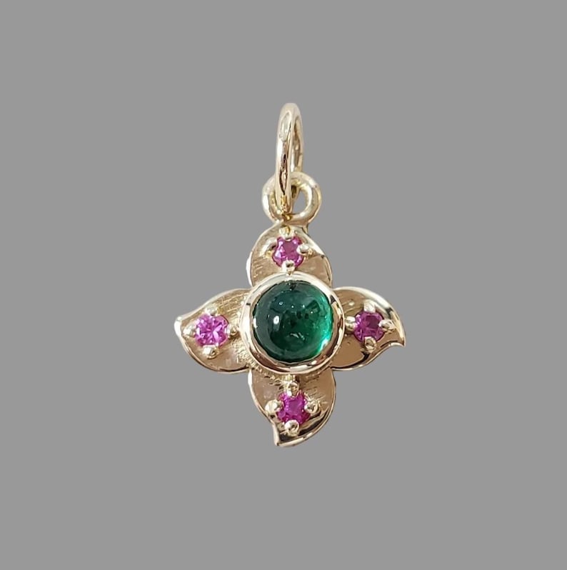 Emerald ruby pendant with Zambian emerald cabochon in 14K gold flower