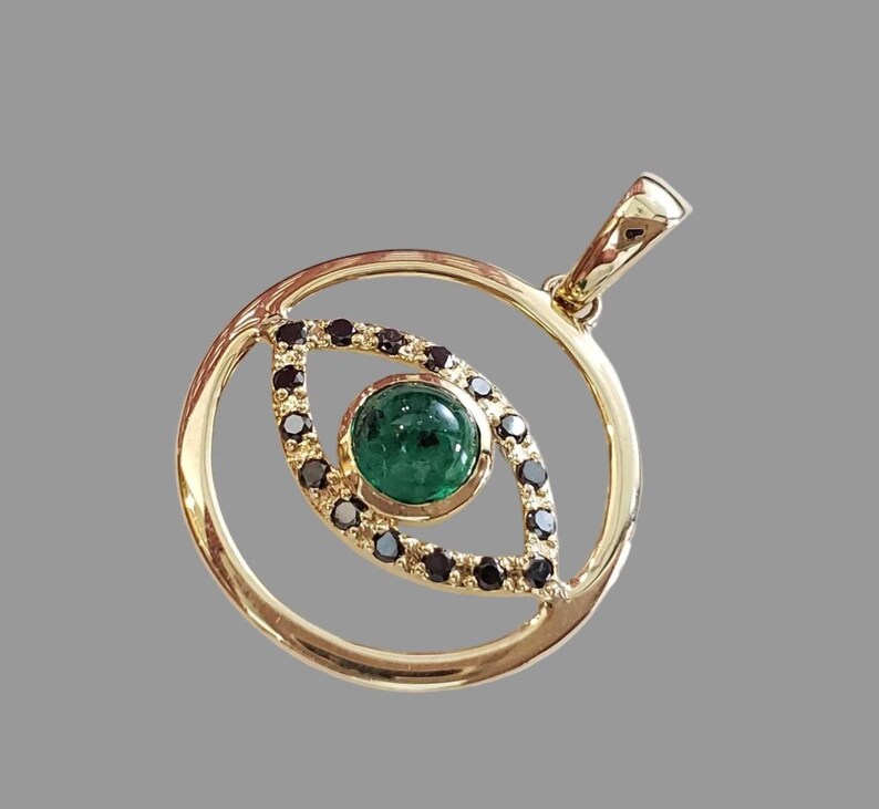 Pendentif en or 18 carats avec diamant et mauvais œil