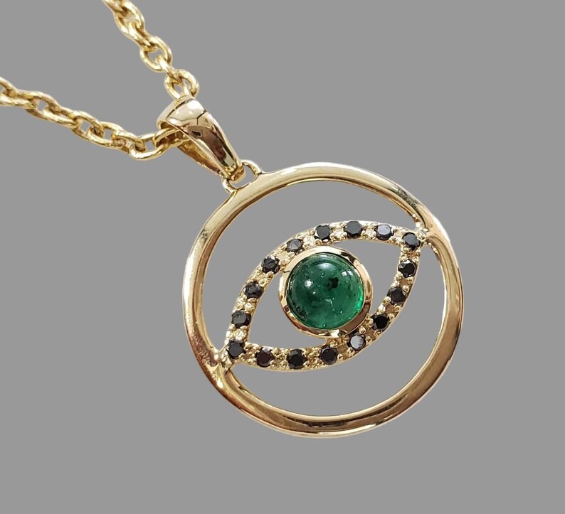 Pendentif en or 18 carats avec diamant et mauvais œil