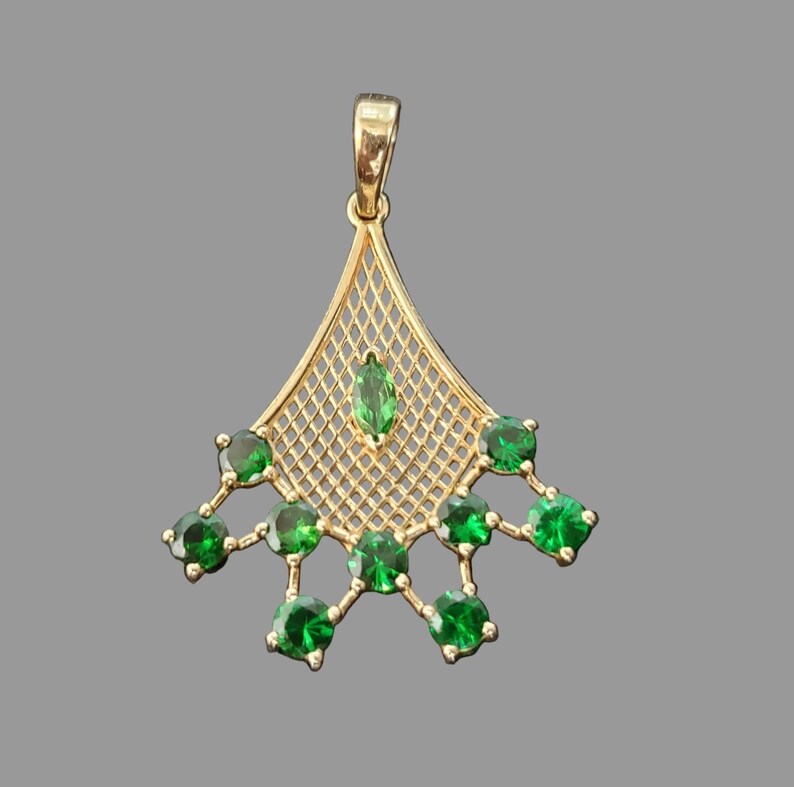 Pendentif papillon en tourmaline rose et or 14 carats