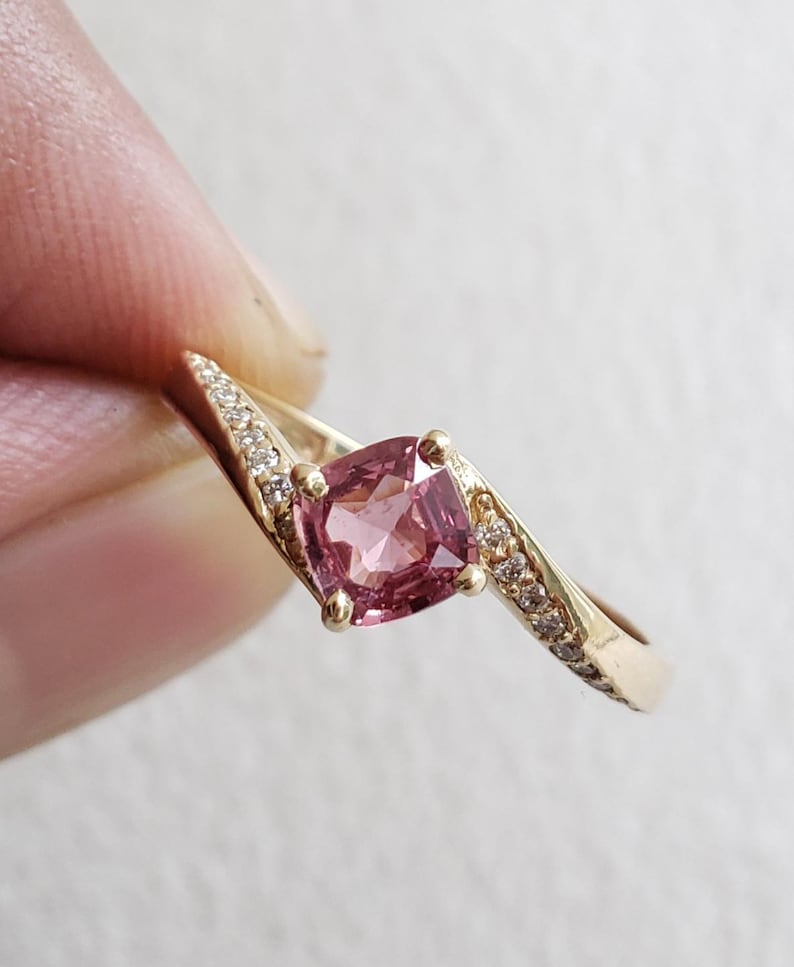 Pink sapphire engagement ring alternative, side view