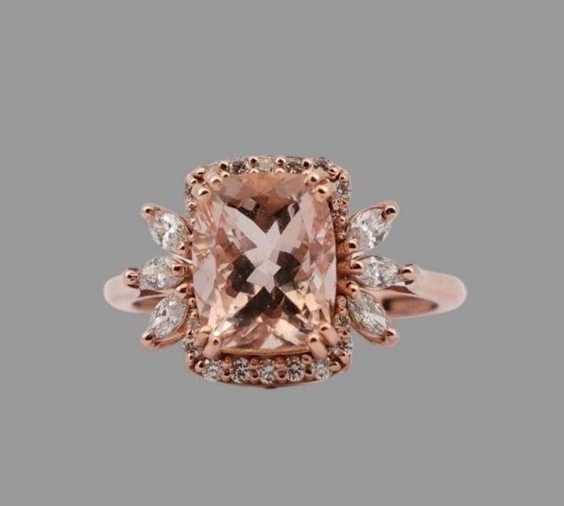 Morganite engagement ring with peach cushion and floral diamond halo