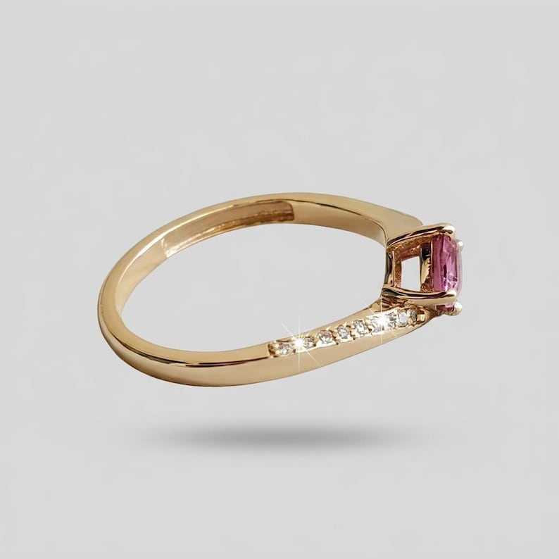 Bypass ring with diamonds along curved gold band