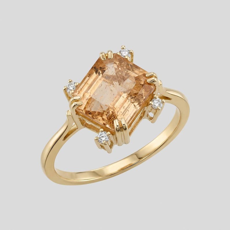 Imperial topaz ring with Asscher cut stone in 14K gold
