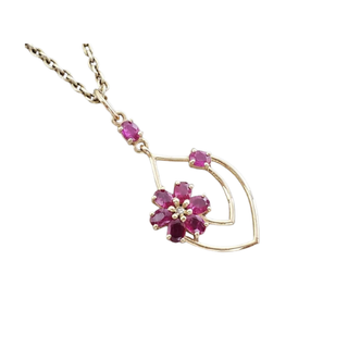 Pendentif en or 14 carats et rubis : Bijou Art Déco à motif floral