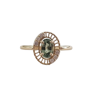 18 Karat Goldring mit blauem Saphir und Diamant im Brillantschliff