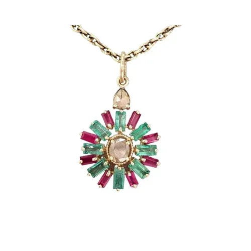 Elegant gold pendant with emerald and ruby accents, showcasing luxury jewelry design