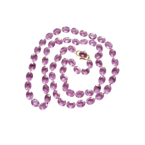 Elegant pink gemstone necklace with gold clasp, perfect for luxury jewelry collections