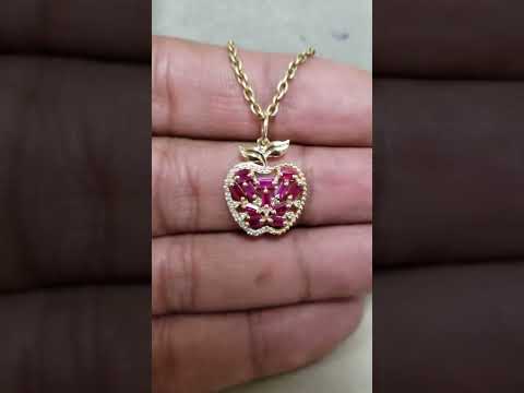 14 Karat Gold Oval Cabochon Rubin Anhänger