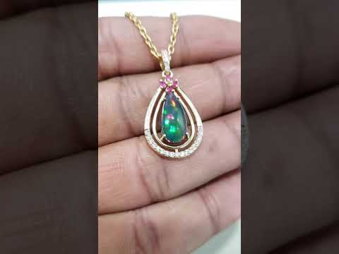 14 Karat Gold-Anhänger mit birnenförmigem Opal und Diamant