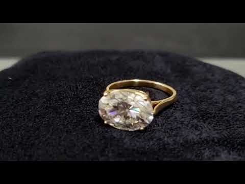18 Karat Goldring mit Moissanit und Diamanten