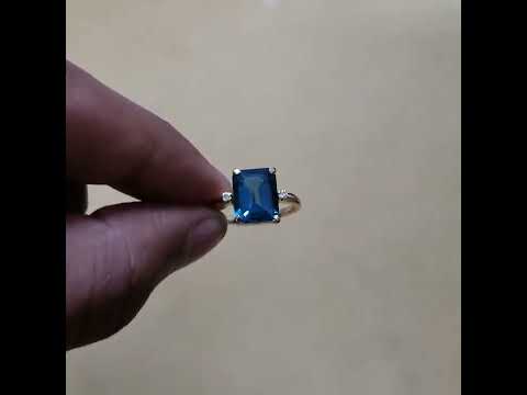 18 Karat Goldring mit London-Blautopas und Diamanten