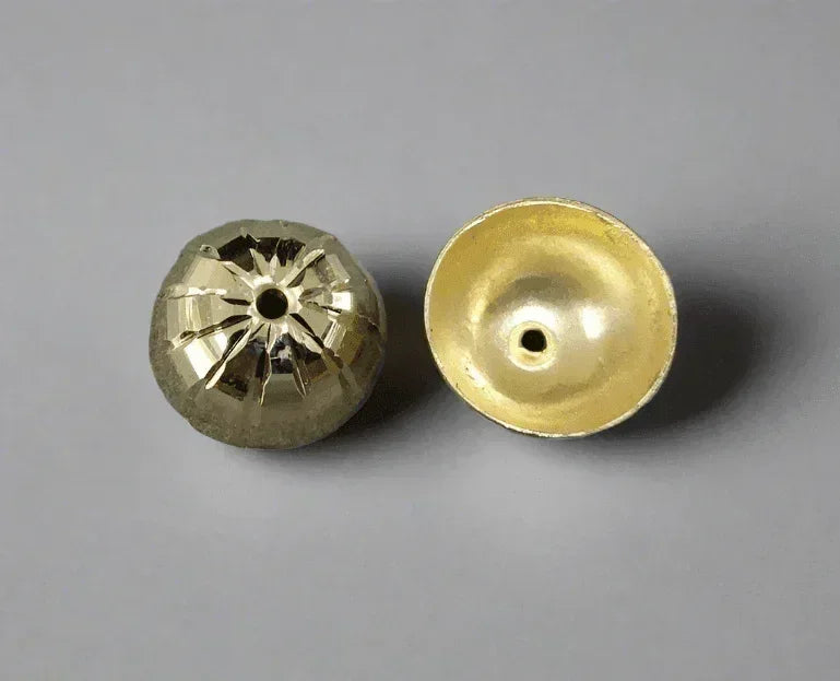 Faceted gold-tone bead cap for jewelry making, elegant design with smooth interior