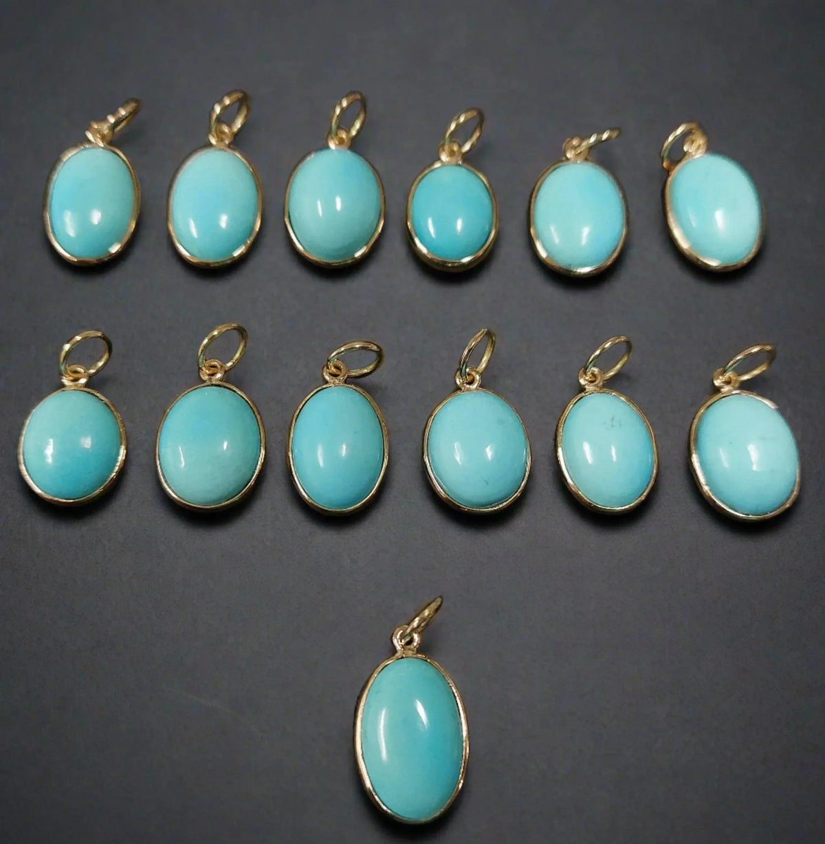 Oval turquoise pendants in gold settings, elegant jewelry accessories for necklaces