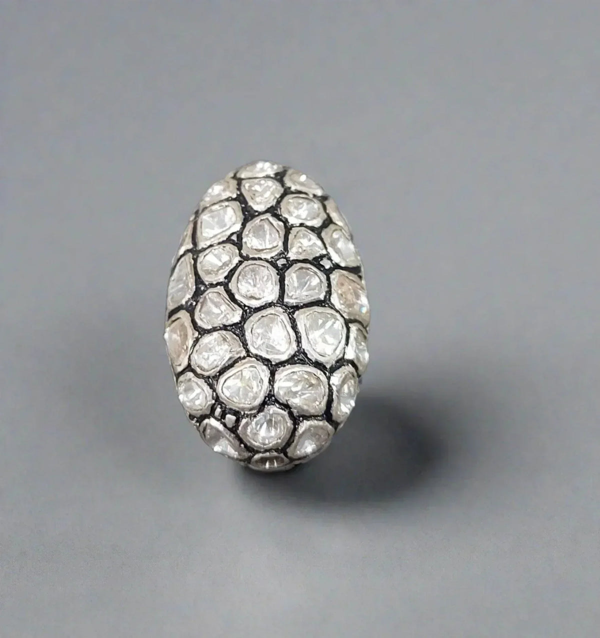 Elegant diamond cluster ring with intricate pave setting, showcasing brilliance and luxury jewelry design