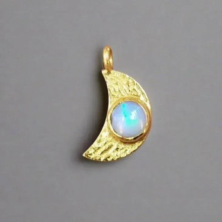 Gold crescent moon pendant with opal stone, elegant jewelry accessory