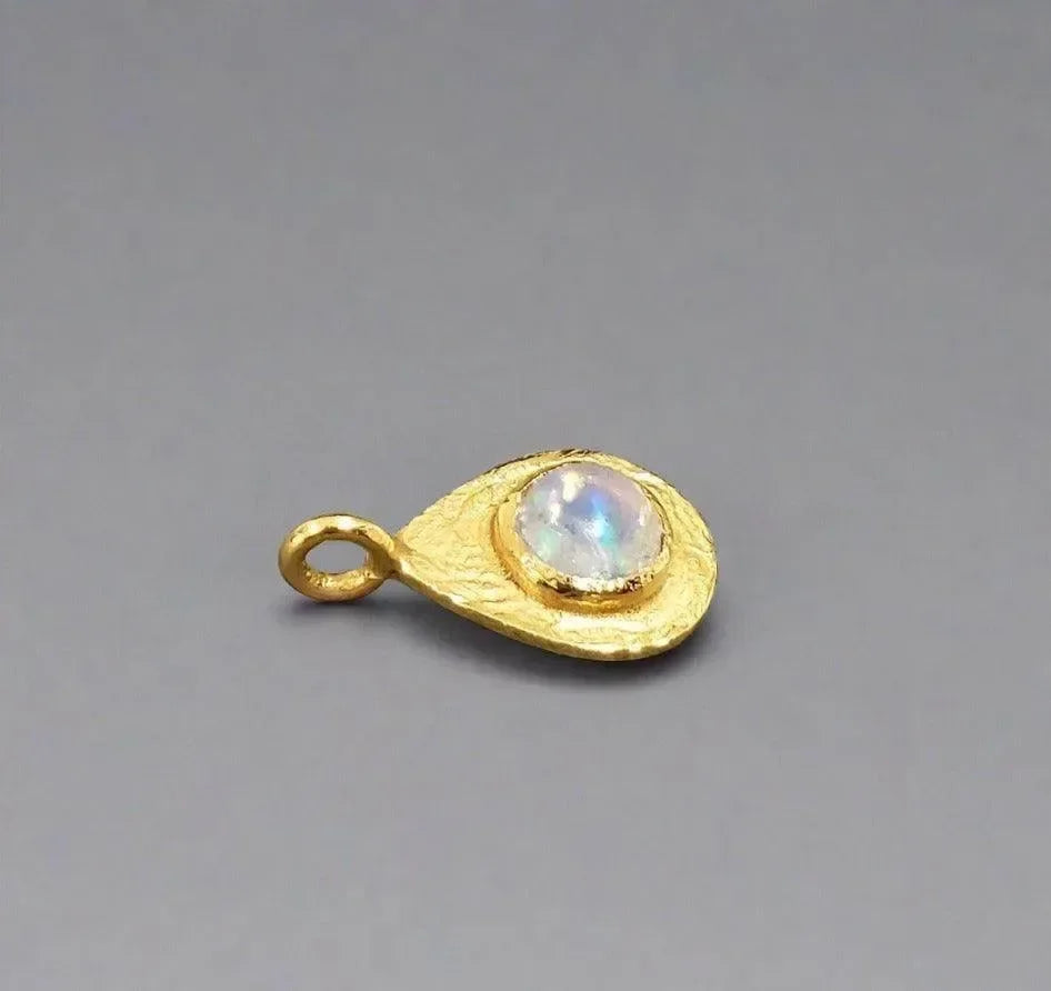 Gold teardrop pendant with iridescent moonstone, elegant jewelry accessory