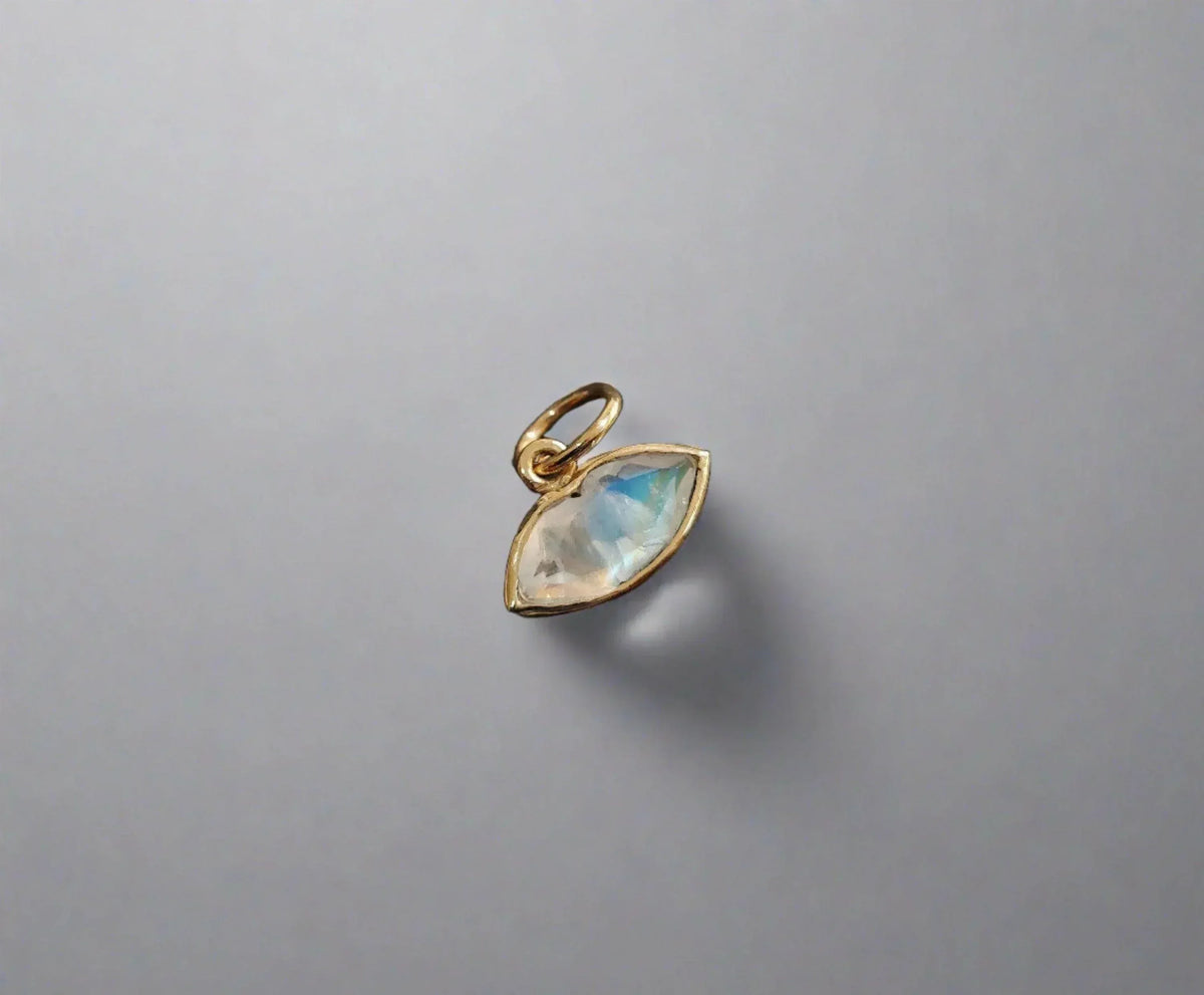 Gold pendant with marquise-cut moonstone, elegant jewelry accessory
