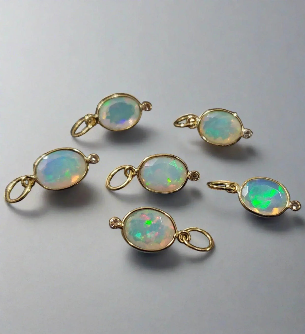 Elegant gold opal pendants with iridescent glow, fine jewelry accessories for luxury style