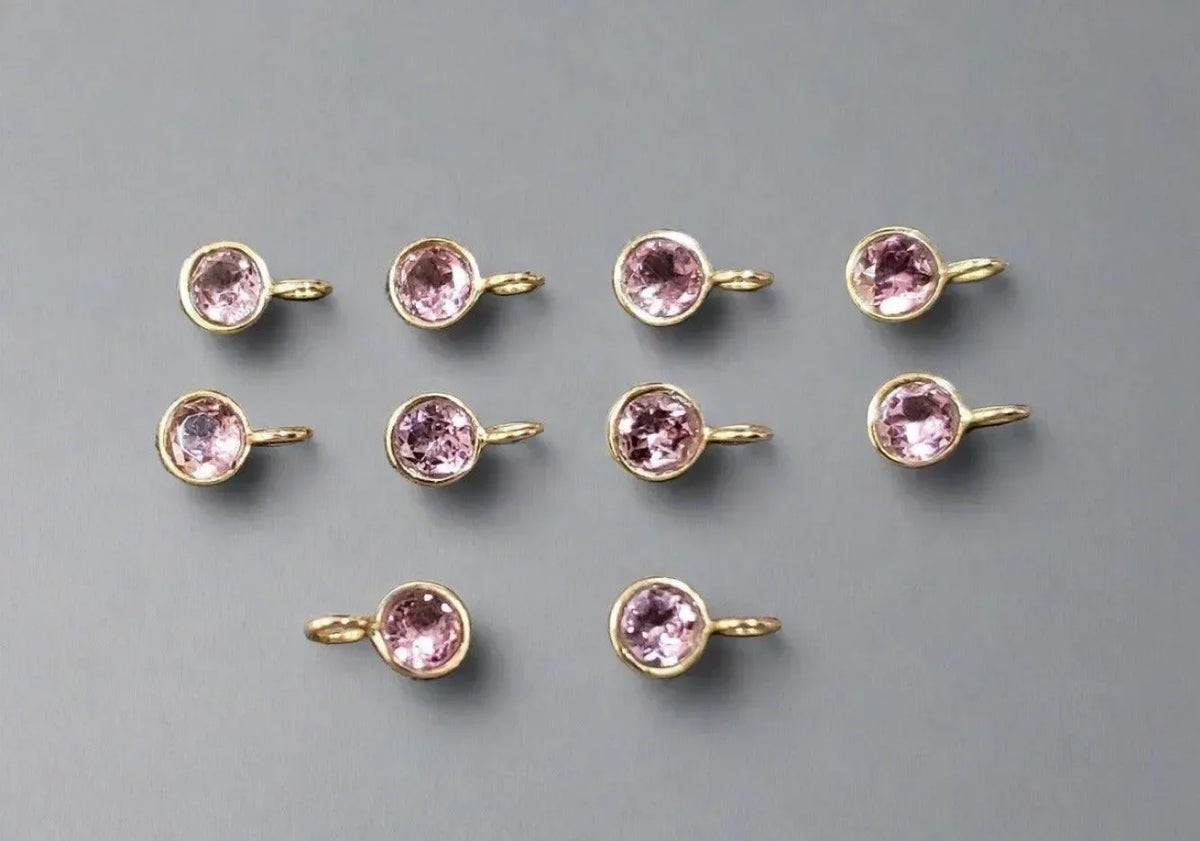 Pink gemstone gold charms for elegant jewelry making, perfect for necklaces or bracelets