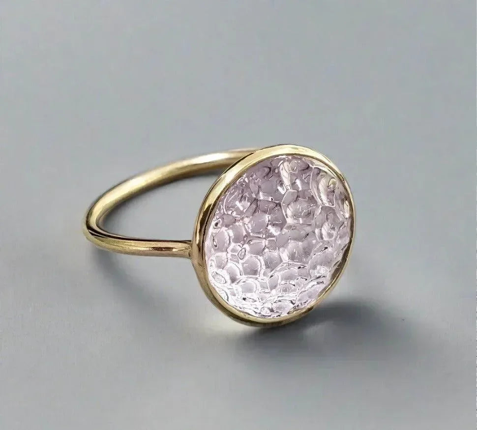 Elegant gold ring with textured pink gemstone, fine jewelry accessory